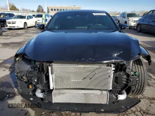 2023 Genesis G70 2.0T with VIN KMTG34TA5PU132838, listed as a Copart auction lot 85335444 with 5,970 mi miles and Salvage Title. Bid and sale history available at DreamBid. Image 5.