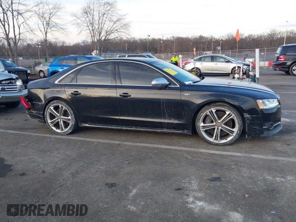 2015 Audi S8 with VIN WAUK2AFD5FN027013, listed as a IAAI auction lot 41456289 with 77,877 mi miles. Bid and sale history available at carsss.com. Image 13.