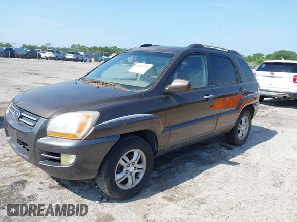2005 Kia Sportage LX with VIN KNDJF723557133872, listed as a IAAI auction lot 42203702 with 181,132 mi miles and . Bid and sale history available at carsss.com. Image 2.