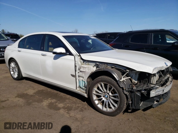 2014 BMW 7 Series 740Li xDrive with VIN WBAYF4C50ED281830, listed as a Copart auction lot 48557035 with 129,497 mi miles and Salvage Title. Bid and sale history available at carsss.com. Image 4.