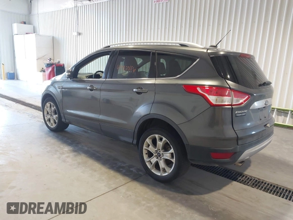 2016 Ford Escape Titanium with VIN 1FMCU9J9XGUC30596, listed as a IAAI auction lot 42024166 with 179,340 mi miles. Bid and sale history available at carsss.com. Image 3.