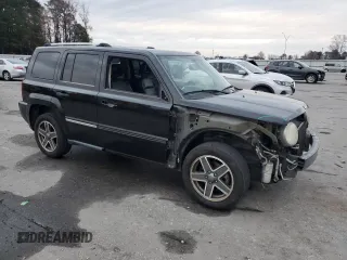 2008 Jeep Patriot Limited with VIN 1J8FT48W48D784052, listed as a Copart auction lot 84466004 with 124,667 mi miles and Salvage Title. Bid and sale history available at DreamBid. Image 4.