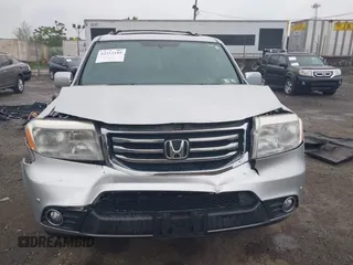 2013 Honda Pilot Touring z VIN 5FNYF4H96DB051005, wystawiony jako IAAI lot #42211189 z przebiegiem 215 594 mil mil oraz . Historia ofert i sprzedaży dostępna na DreamBid. Obrazek 12.