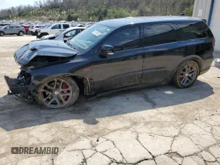 2019 Dodge Durango SRT with VIN 1C4SDJGJ7KC699873, listed as a Copart auction lot 51120255 with 126,873 mi miles and Salvage title. Bid and sale history available at DreamBid. Image 1.