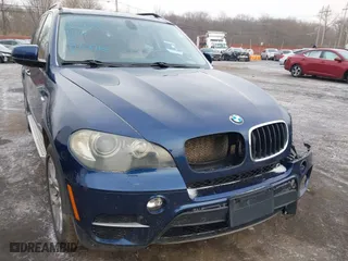 2011 BMW X5 35i with VIN 5UXZV4C54BL738262, listed as a IAAI auction lot 41633474 with 173,914 mi miles. Bid and sale history available at carsss.com. Image 18.