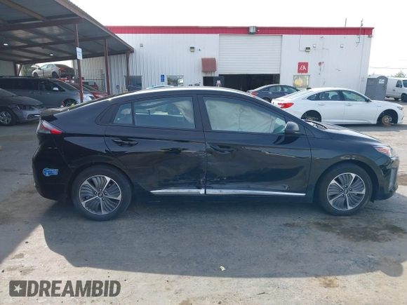 2021 Hyundai Ioniq SE with VIN KMHC65LD3MU249765, listed as a IAAI auction lot 41986977 with 63,363 mi miles and . Bid and sale history available at DreamBid. Image 12.