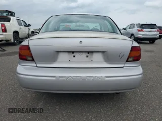 2000 Saturn SL с VIN 1G8ZG5284YZ152285, выставлен на аукционе Copart как лот 59344165 с пробегом Не указан миль и Списание • Salvage title. История ставок и продаж доступна на DreamBid. Изображение 6.