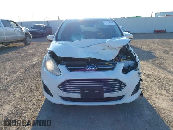 2013 Ford C-Max SE z VIN 1FADP5AU8DL556370, wystawiony jako IAAI lot #41276760 z przebiegiem 135 618 mil mil oraz . Historia ofert i sprzedaży dostępna na DreamBid. Obrazek 6.