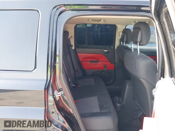 2013 Jeep Patriot Sport with VIN 1C4NJPBA0DD238009, listed as a IAAI auction lot 42301422 with 103,359 mi miles and . Bid and sale history available at DreamBid. Image 8.
