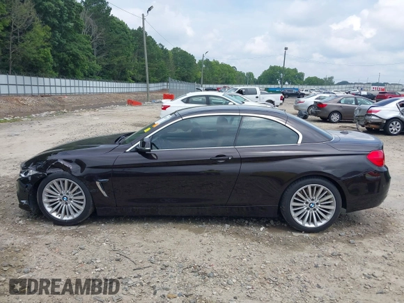 2014 BMW 4 Series 435i with VIN WBA3T3C50EJ876997, listed as a IAAI auction lot 42406299 with 115,048 mi miles and . Bid and sale history available at DreamBid. Image 14.