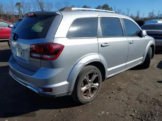 2015 Dodge Journey Crossroad with VIN 3C4PDCGG9FT682881, listed as a IAAI auction lot 41679540 with 999,999 mi miles. Bid and sale history available at carsss.com. Image 4.