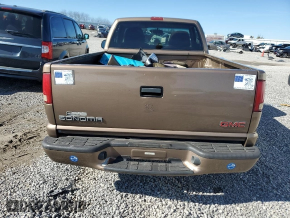 2002 GMC Sonoma SL z VIN 1GTCS145628255534, wystawiony jako Copart lot #80115964 z przebiegiem 78 550 mil mil oraz Szkody całkowita. Historia ofert i sprzedaży dostępna na DreamBid. Obrazek 6.