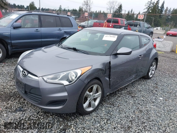 2012 Hyundai Veloster w/Gray Int z VIN KMHTC6AD7CU037130, wystawiony jako IAAI lot #41778588 z przebiegiem 125 549 mil mil oraz . Historia ofert i sprzedaży dostępna na DreamBid. Obrazek 17.