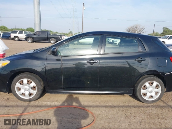 2009 Toyota Matrix with VIN 2T1KU40E69C091858, listed as a IAAI auction lot 41925490 with 153,161 mi miles. Bid and sale history available at carsss.com. Image 14.