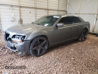 2012 Chrysler 300 S with VIN 2C3CCABG6CH175586, listed as a Copart auction lot 44912215 with 214,145 mi miles and Salvage Title. Bid and sale history available at carsss.com. Image 1.