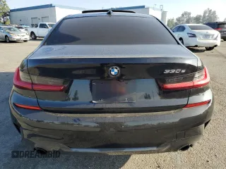 2021 BMW 3 Series 330e with VIN 3MW5P7J03M8C03997, listed as a Copart auction lot 83113614 with 0 mi miles and Salvage Title. Bid and sale history available at carsss.com. Image 6.