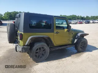2010 Jeep Wrangler Sahara with VIN 1J4AA5D16AL203910, listed as a Copart auction lot 62891315 with 124,337 mi miles and Salvage title. Bid and sale history available at DreamBid. Image 3.