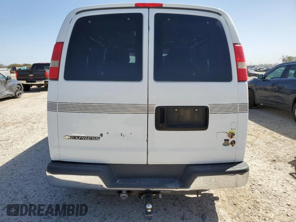 2007 Chevrolet Express Passenger z VIN 1GBFG15T471230597, wystawiony jako Copart lot #46646695 z przebiegiem 154 251 mil mil oraz Szkoda całkowita • Salvage title. Historia ofert i sprzedaży dostępna na DreamBid. Obrazek 6.
