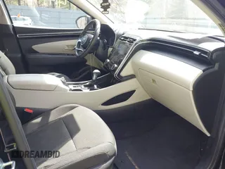 2022 Hyundai Tucson SEL z VIN 5NMJBCAE9NH034987, wystawiony jako IAAI lot #41979143 z przebiegiem 68 625 mil mil oraz . Historia ofert i sprzedaży dostępna na DreamBid. Obrazek 5.
