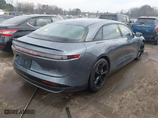 2024 Lucid Air Touring with VIN 50EA1TEA4RA004799, listed as a IAAI auction lot 41651768 with 7,779 mi miles. Bid and sale history available at carsss.com. Image 4.