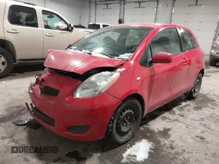 2009 Toyota Yaris with VIN JTDJT903695262292, listed as a IAAI auction lot 41636204 with 157,986 mi miles. Bid and sale history available at carsss.com. Image 17.
