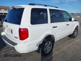 2005 Honda Pilot EX with VIN 5FNYF18475B060655, listed as a IAAI auction lot 41381619 with 142,680 mi miles and . Bid and sale history available at DreamBid. Image 4.