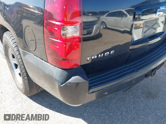 2007 Chevrolet Tahoe LTZ with VIN 1GNFC13J67R245233, listed as a IAAI auction lot 41726159 with 203,841 mi miles and . Bid and sale history available at DreamBid. Image 13.