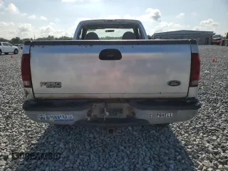 2001 Ford F-250 XL with VIN 1FTNF21L11EC49565, listed as a Copart auction lot 57776185 with 110,842 mi miles and Salvage title. Bid and sale history available at DreamBid. Image 6.