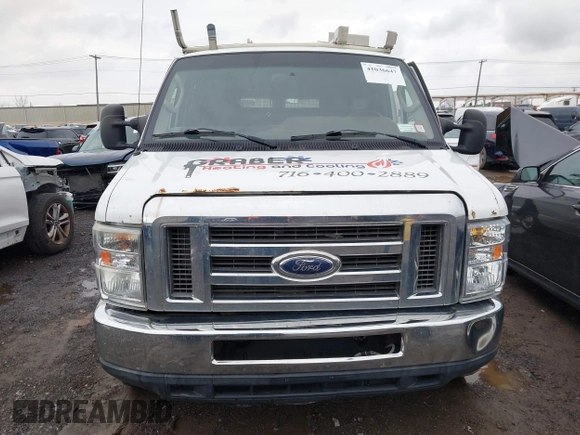 2011 Ford Econoline Cargo Commercial with VIN 1FTNE1EW1BDA17492, listed as a IAAI auction lot 41036647 with 242,810 mi miles and . Bid and sale history available at DreamBid. Image 12.