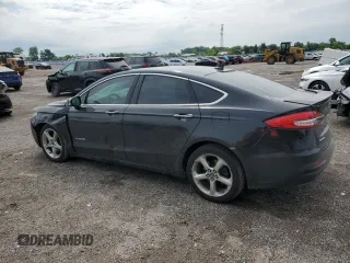 2019 Ford Fusion Titanium z VIN 3FA6P0RU4KR211674, wystawiony jako Copart lot #62205885 z przebiegiem 313 261 mil mil oraz Szkoda całkowita • Salvage title. Historia ofert i sprzedaży dostępna na DreamBid. Obrazek 2.