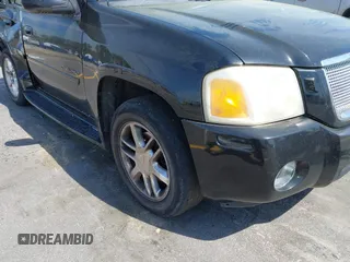 2007 GMC Envoy Denali with VIN 1GKES63MX72103849, listed as a IAAI auction lot 41904190 with 237,261 mi miles. Bid and sale history available at carsss.com. Image 16.