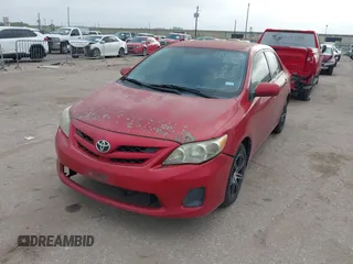 2011 Toyota Corolla L with VIN 2T1BU4EE2BC601203, listed as a IAAI auction lot 41913651 with 180,942 mi miles. Bid and sale history available at carsss.com. Image 2.
