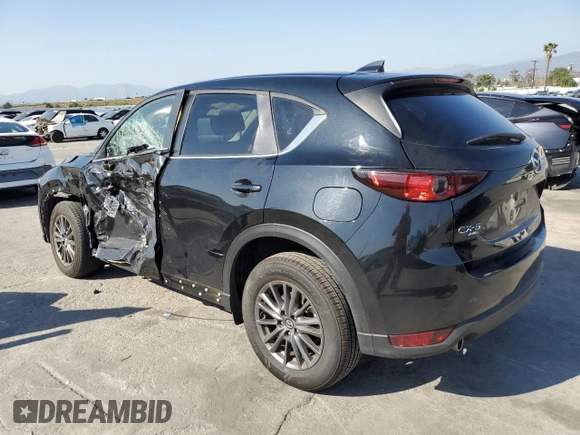 2021 Mazda CX-5 Touring with VIN JM3KFBCM8M0495899, listed as a Copart auction lot 51049235 with 31,164 mi miles and Salvage Title. Bid and sale history available at carsss.com. Image 2.