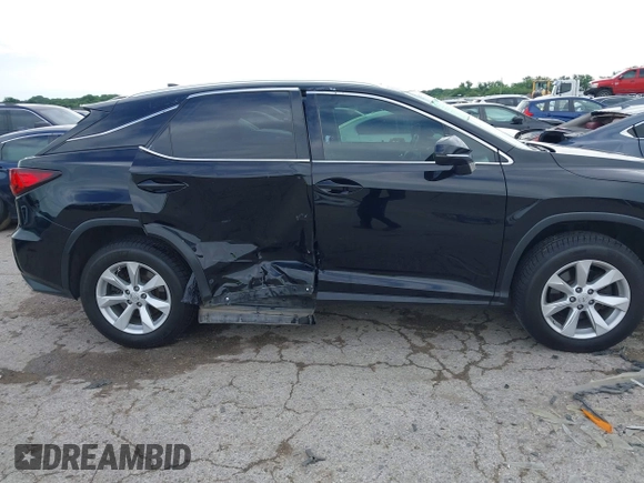 2016 Lexus RX 350 z VIN 2T2BZMCA4GC017342, wystawiony jako IAAI lot #42357093 z przebiegiem 142 515 mil mil oraz . Historia ofert i sprzedaży dostępna na DreamBid. Obrazek 13.
