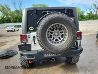 2015 Jeep Wrangler Unlimited Rubicon with VIN 1C4BJWFGXFL518301, listed as a Copart auction lot 61910775 with 153,945 mi miles and Clean title. Bid and sale history available at DreamBid. Image 6.