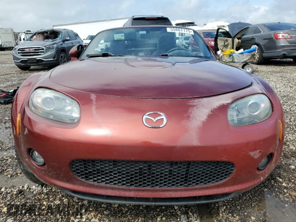 2006 Mazda MX-5 Miata Touring z VIN JM1NC25F260121773, wystawiony jako Copart lot #55887175 z przebiegiem Nie podano mil oraz Szkoda całkowita • Salvage title. Historia ofert i sprzedaży dostępna na DreamBid. Obrazek 5.