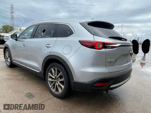 2017 Mazda CX-9 Grand Touring with VIN JM3TCADY7H0136915, listed as a Copart auction lot 57106855 with 135,872 mi miles and Clean title. Bid and sale history available at DreamBid. Image 3.