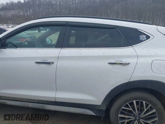 2019 Hyundai Tucson Ultimate with VIN KM8J3CALXKU016834, listed as a IAAI auction lot 40970606 with 104,208 mi miles. Bid and sale history available at carsss.com. Image 14.