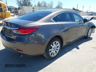 2016 Mazda 6 i Sport with VIN JM1GJ1U57G1417675, listed as a IAAI auction lot 41855939 with 111,368 mi miles and . Bid and sale history available at carsss.com. Image 4.