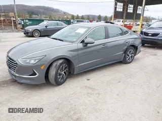 2022 Hyundai Sonata Hybrid Blue with VIN KMHL24JJ2NA048439, listed as a IAAI auction lot 40942477 with 64,855 mi miles. Bid and sale history available at carsss.com. Image 18.