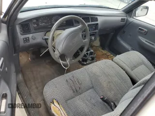1995 Toyota T100 DX with VIN JT4VD12E2S0009844, listed as a Copart auction lot 51738525 with 357,475 mi miles and Salvage Title. Bid and sale history available at carsss.com. Image 8.