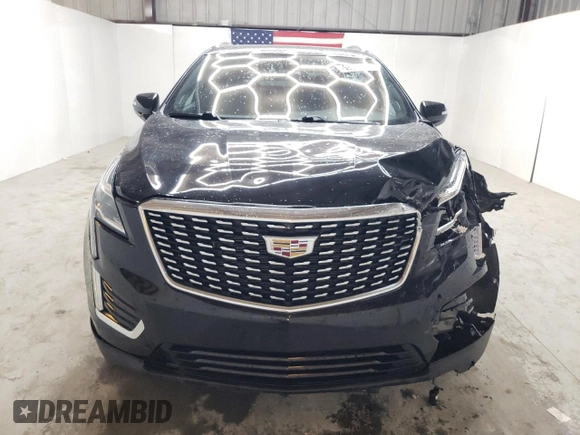 2023 Cadillac XT5 FWD Premium Luxury with VIN 1GYKNCRS6PZ171335, listed as a Copart auction lot 51859385 with 52,691 mi miles and Clean Title. Bid and sale history available at carsss.com. Image 5.