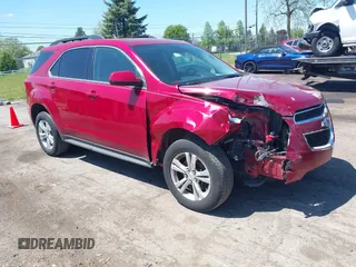 2014 Chevrolet Equinox LT z VIN 2GNALBEKXE6334561, wystawiony jako IAAI lot #42220912 z przebiegiem 124 526 mil mil oraz . Historia ofert i sprzedaży dostępna na DreamBid. Obrazek 1.