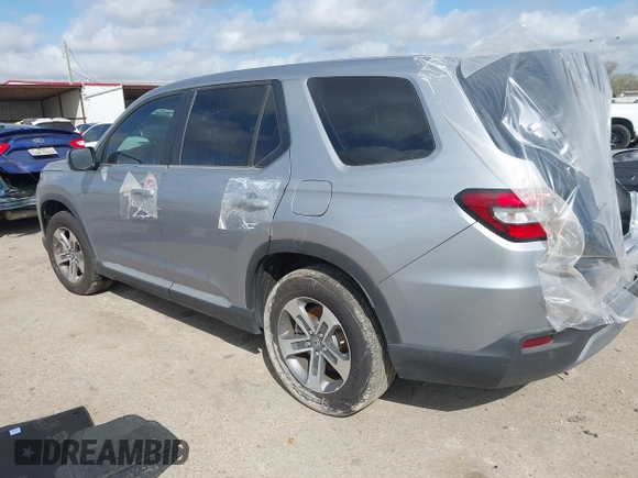 2025 Honda Pilot EX-L z VIN 5FNYG2H46SB013504, wystawiony jako IAAI lot #41777928 z przebiegiem 5 163 mil mil oraz . Historia ofert i sprzedaży dostępna na DreamBid. Obrazek 3.