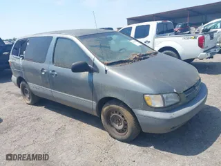 1998 Toyota Sienna LE with VIN 4T3ZF13CXWU053682, listed as a IAAI auction lot 42029382 with 237,471 mi miles. Bid and sale history available at carsss.com. Image 1.