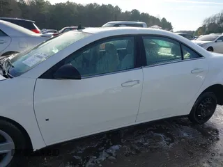 2009 Pontiac G6 1SA z VIN 1G2ZG57B394187803, wystawiony jako IAAI lot #41100404 z przebiegiem 242 388 mil mil oraz . Historia ofert i sprzedaży dostępna na DreamBid. Obrazek 14.