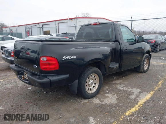 2001 Ford F-150 XL with VIN 2FTZF07211CA54107, listed as a IAAI auction lot 41450483 with 153,699 mi miles. Bid and sale history available at carsss.com. Image 4.