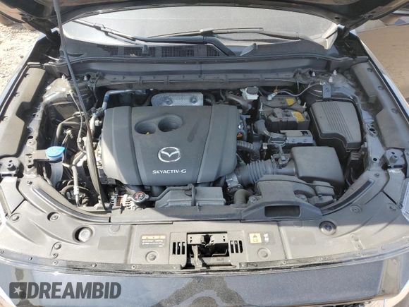 2024 Mazda CX-5 S Carbon Edition z VIN JM3KFBCL8R0489292, wystawiony jako Copart lot #55098625 z przebiegiem 11 132 mil mil oraz Szkoda całkowita • Salvage title. Historia ofert i sprzedaży dostępna na DreamBid. Obrazek 12.