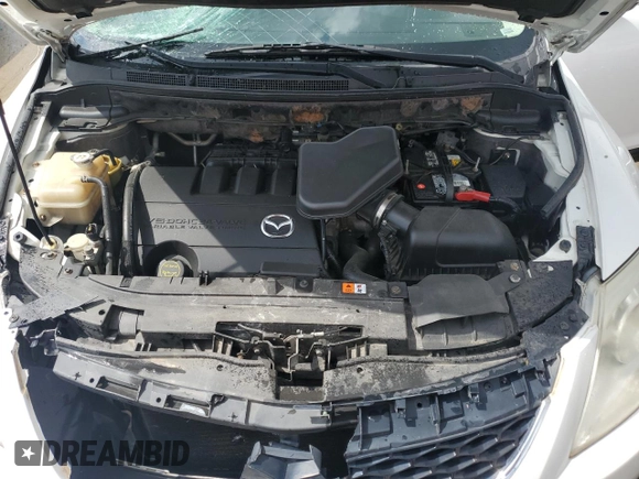 2012 Mazda CX-9 Grand Touring z VIN JM3TB3DA9C0368376, wystawiony jako Copart lot #53994825 z przebiegiem 189 756 mil mil oraz Szkoda całkowita • Salvage title. Historia ofert i sprzedaży dostępna na DreamBid. Obrazek 12.