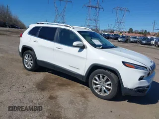 2015 Jeep Cherokee Limited with VIN 1C4PJMDB2FW545430, listed as a IAAI auction lot 41822780 with 135,639 mi miles. Bid and sale history available at carsss.com. Image 1.